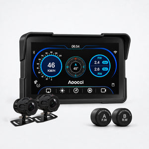 Zwart motorscherm met blauwe meters, twee zwarte camera’s links en twee TPMS-sensoren